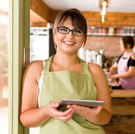 Small business owner in cafe.